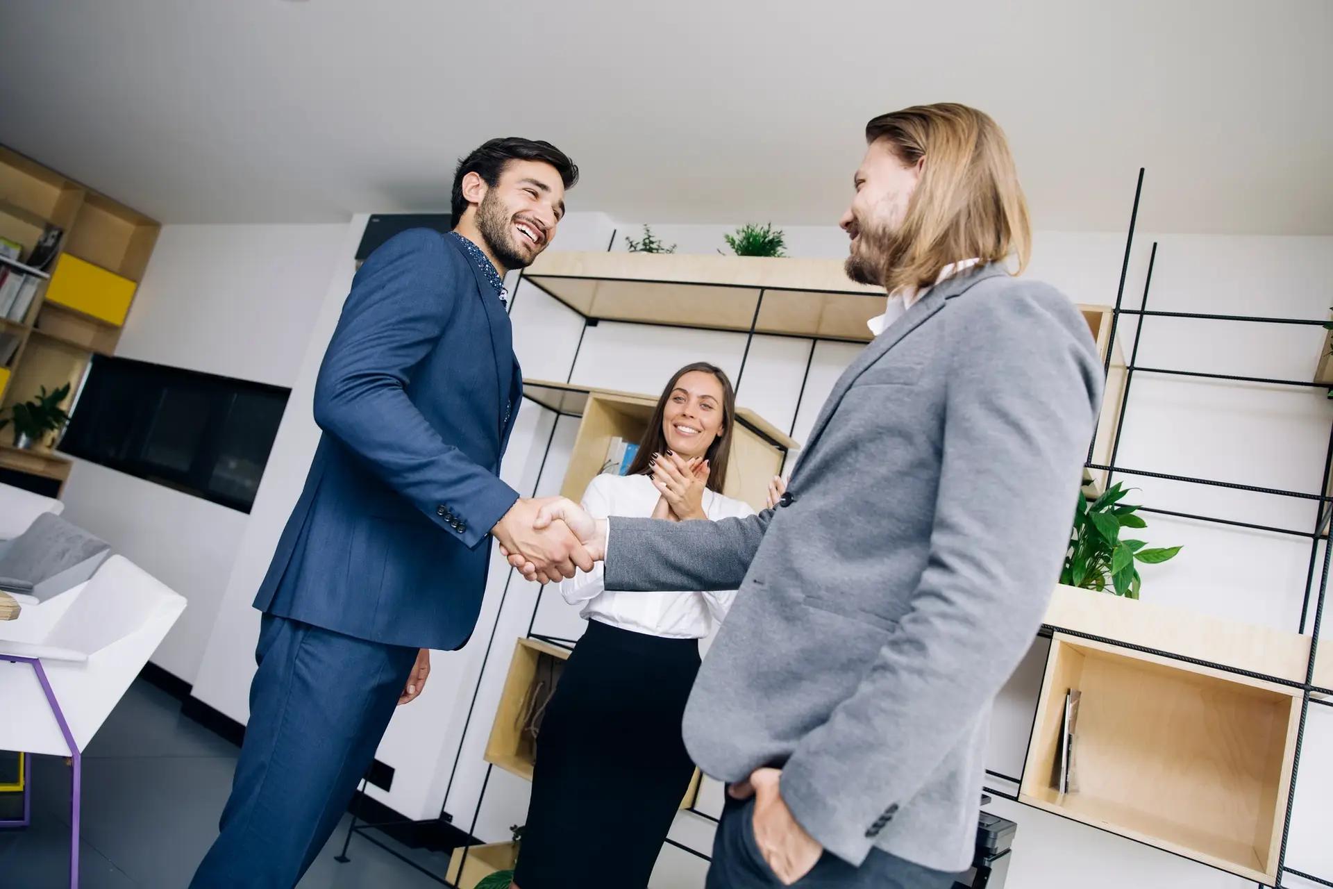 Businessmen handshaking after deal agreement